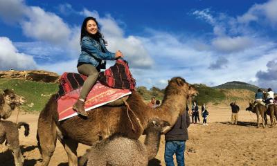 Student pictured riding camel